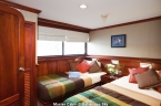 MV Galapagos Sky 23402422_galapagos_sky_master_suite_bed_2__640 Liveaboards 23402422_galapagos_sky_master_suite_bed_2__640.jpg
